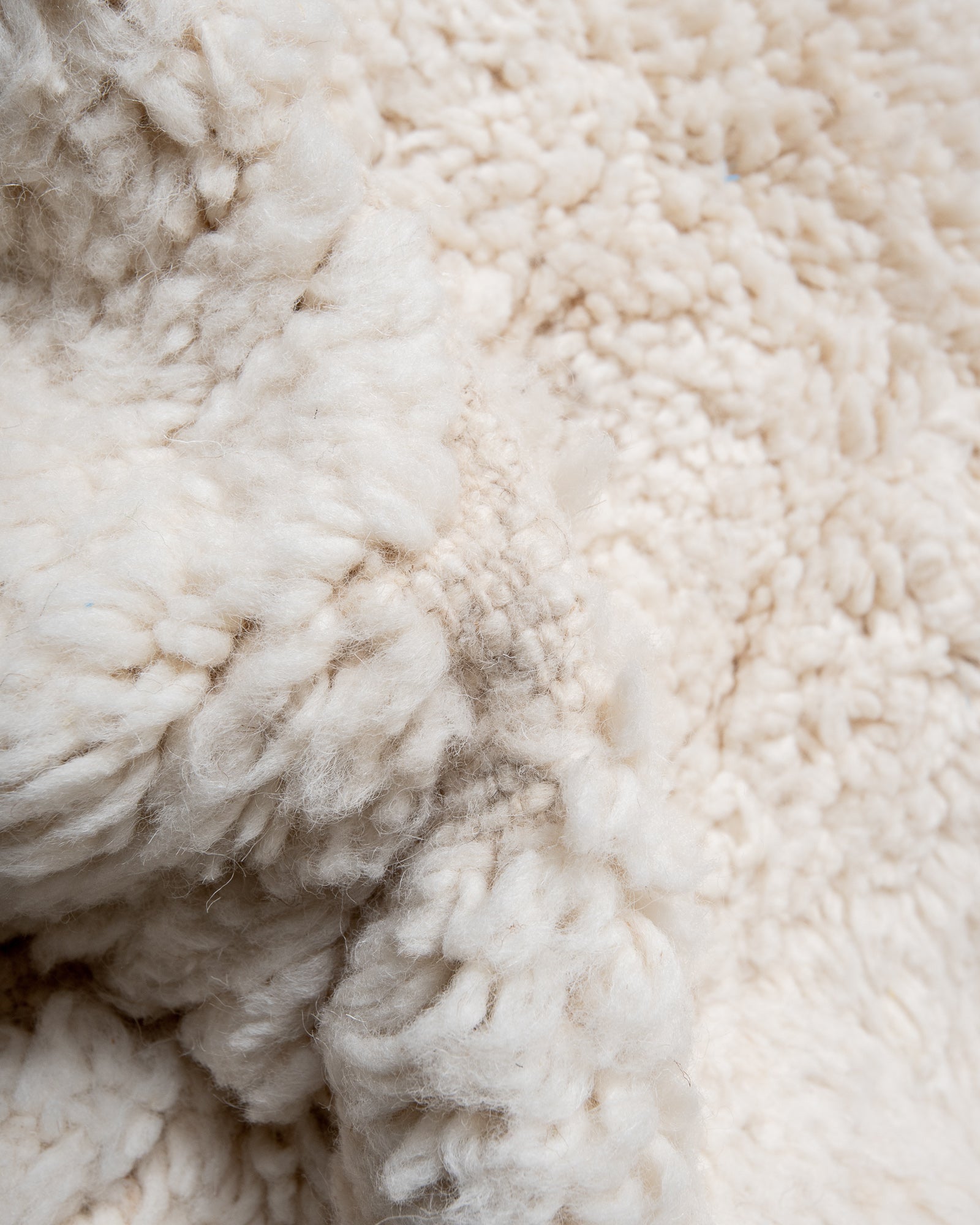 Modern, designer, handcrafted Berber rug from Morocco. Beniourain carpet with beautiful colours and patterns and fluffy wool texture.